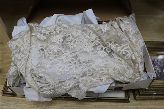 A 1920s lace wedding dress together with a collection of lace and white work and a lace bonnet